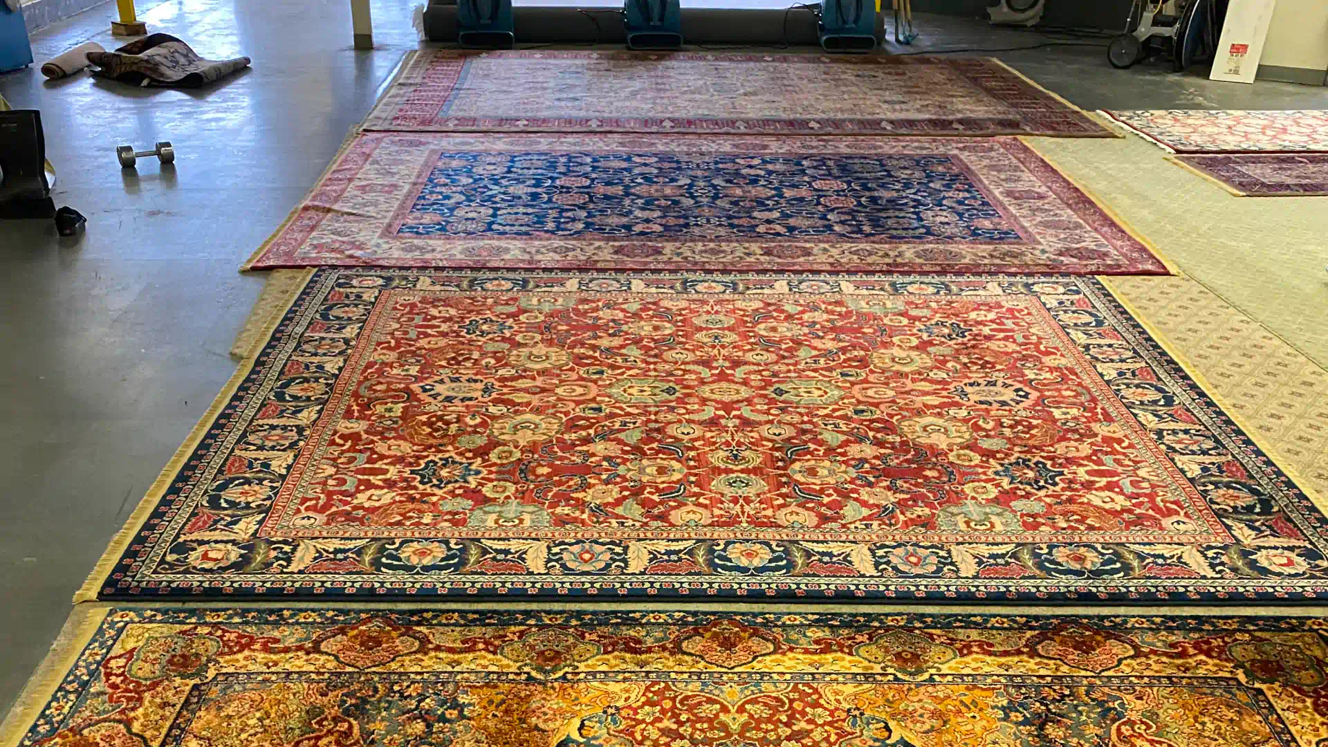 rugs spread out on the floor